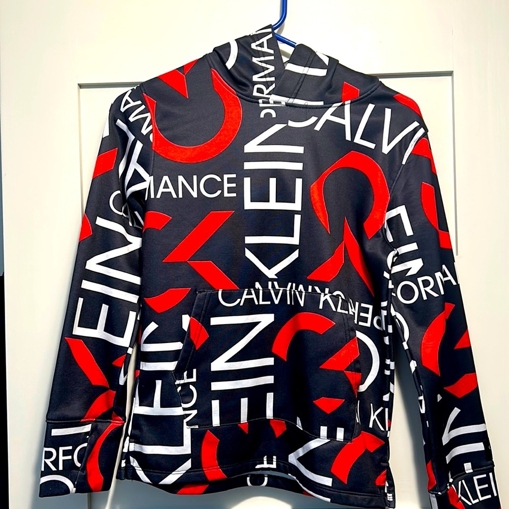 Vibrant Calvin Klein pullover hooded sweatshirt with from pocket.